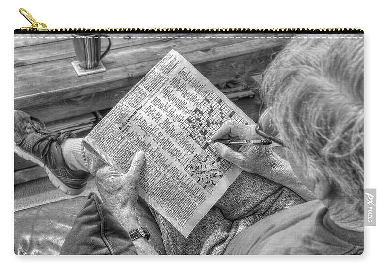 Sunday Crossword Puzzle Zip Pouch featuring the photograph Mind Games - Sunday Crossword Puzzle - Black and White by Jason Politte