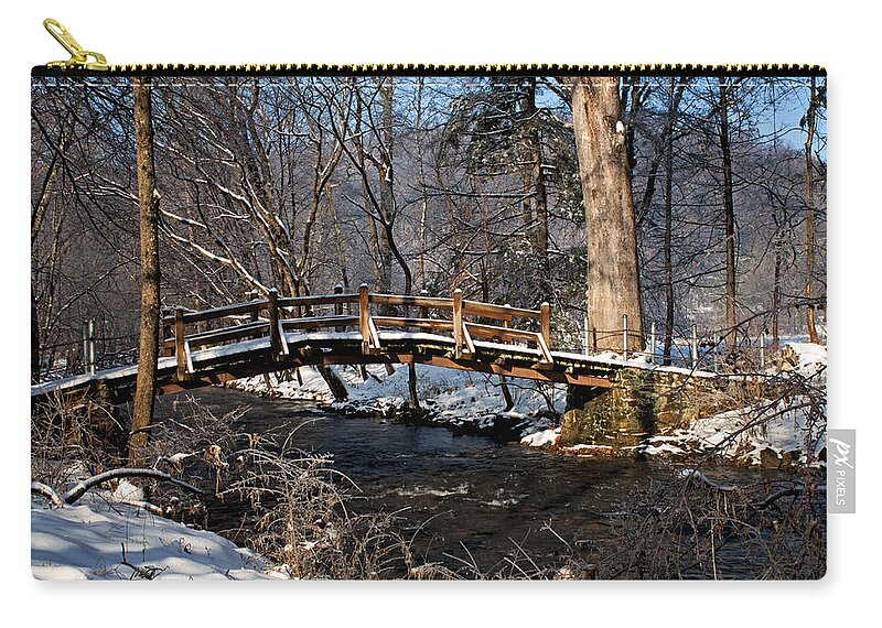 Winter Zip Pouch featuring the photograph Bridge over snowy Valley Creek by Michael Porchik