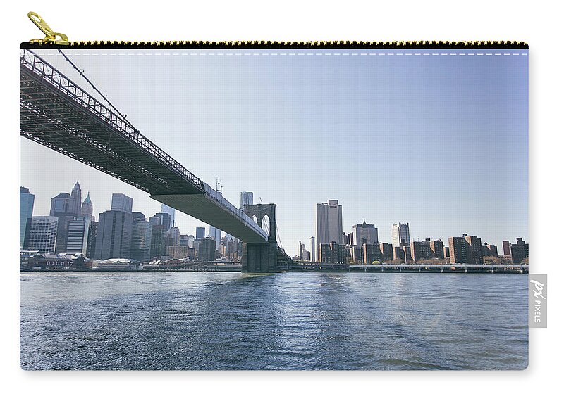 Lower Manhattan Zip Pouch featuring the photograph Brooklyn Bridge And Lower Manhattan by Tuan Tran