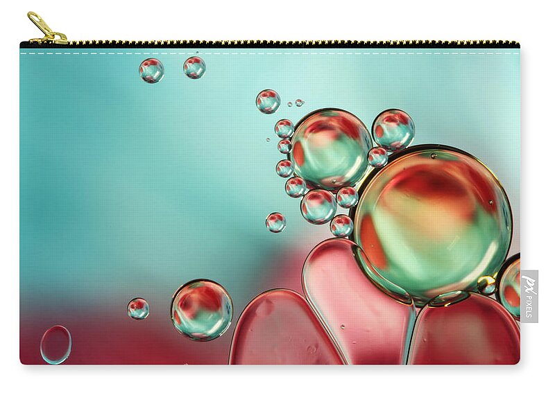 Oil Zip Pouch featuring the photograph Bubble Balance by Sharon Johnstone