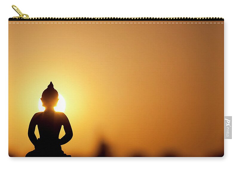 Statue Zip Pouch featuring the photograph Buddha Silhouette And Real Sunrise by Dianahirsch