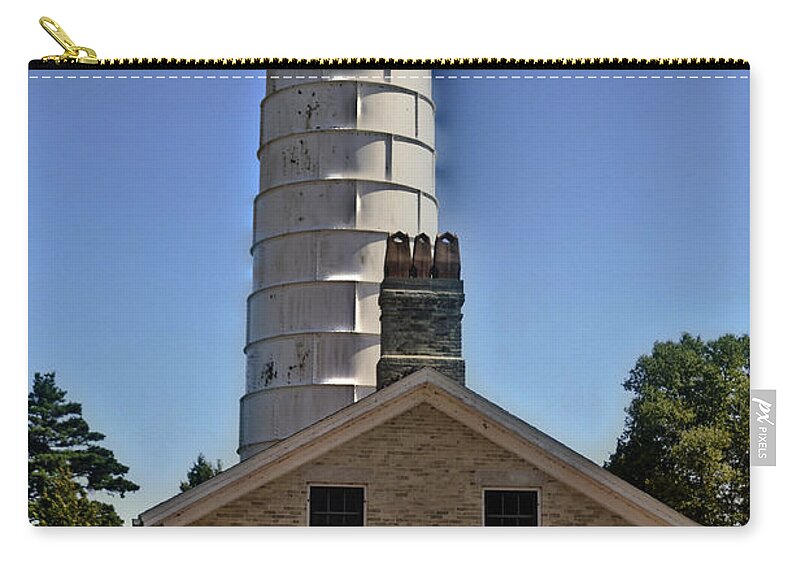 Cana Island Zip Pouch featuring the photograph Cana Island Lighthouse by Deborah Klubertanz