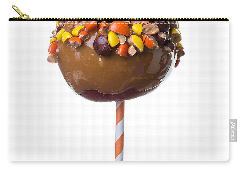 Carmel Zip Pouch featuring the photograph Carmel candied apple with candy by Edward Fielding