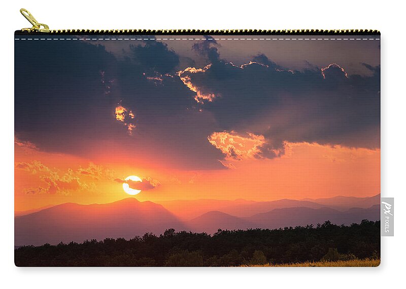 Carpathian Zip Pouch featuring the photograph Carpathian Sunset by Mihai Andritoiu