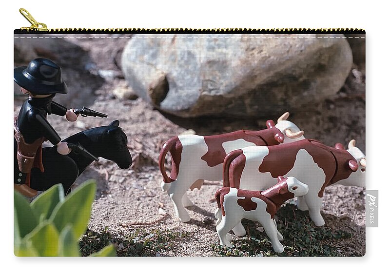 Toys Zip Pouch featuring the photograph Cattle Rustler by Caitlyn Grasso