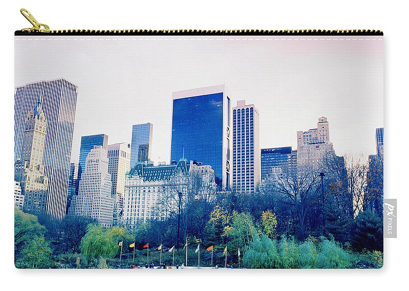 New York Zip Pouch featuring the photograph New York In Motion by Shaun Higson