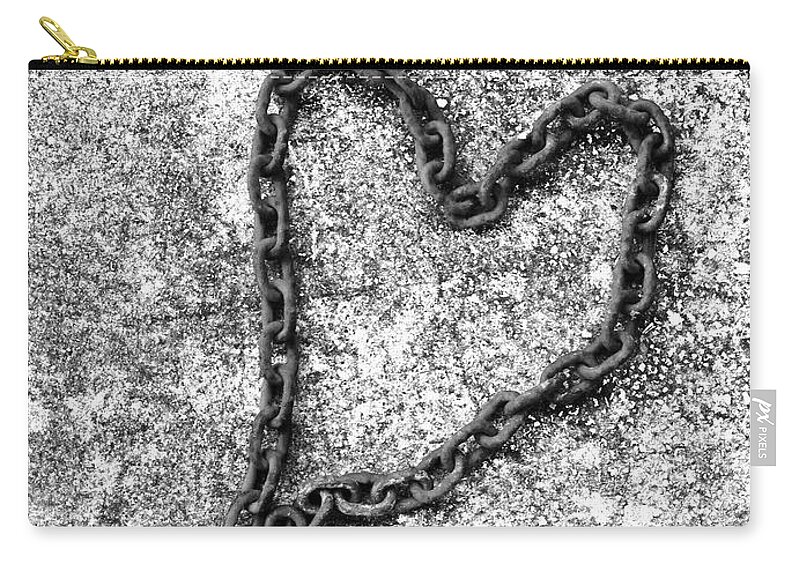 Chain Zip Pouch featuring the photograph Chained heart by WaLdEmAr BoRrErO