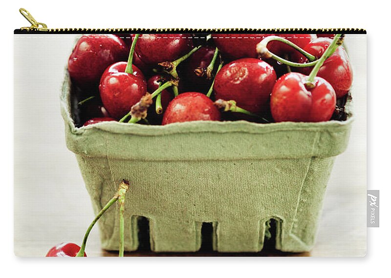 Cherry Zip Pouch featuring the photograph Cherries by Mmeemil