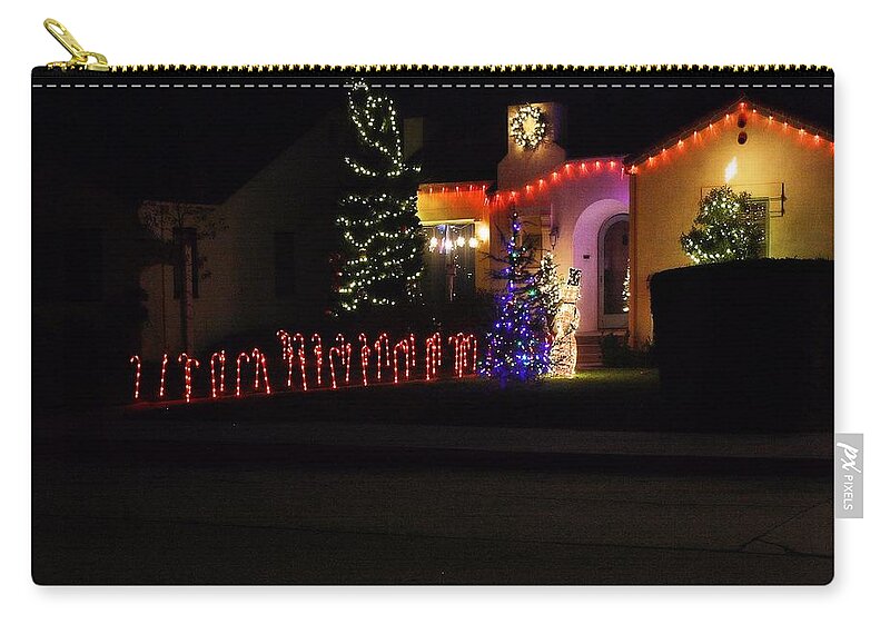 Street Zip Pouch featuring the photograph Christmas Candy Canes by Michael Gordon