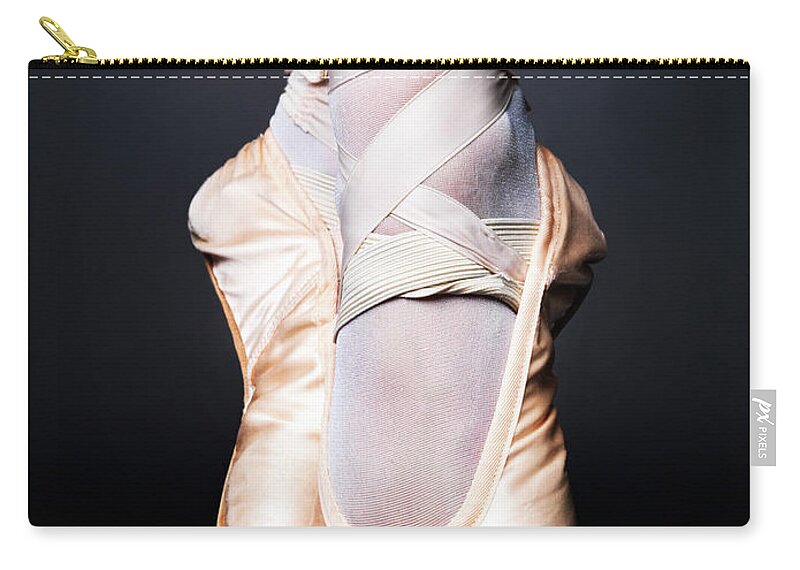 Ballet Dancer Zip Pouch featuring the photograph Closeup Of Pointe Ballet Slippers by Yuri