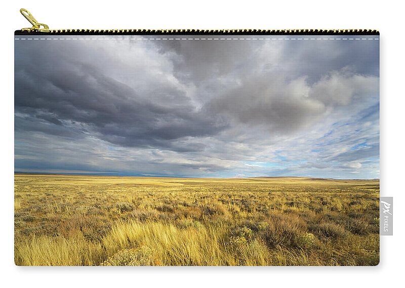 00463511 Carry-all Pouch featuring the photograph Clouds and Prairie Hart Mt N R by Yva Momatiuk John Eastcott