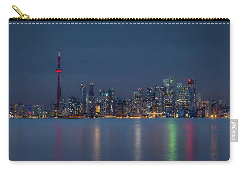 Tranquility Zip Pouch featuring the photograph Cloudy Evening Over Toronto by Jean Surprenant