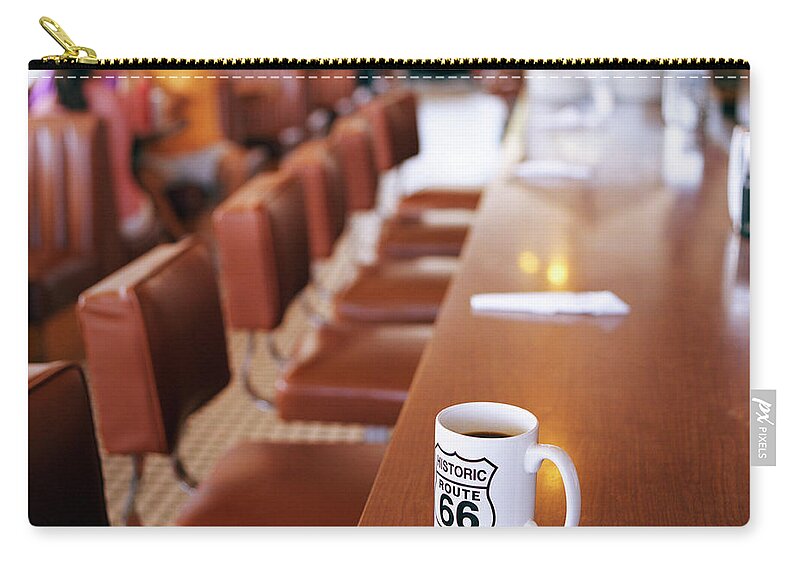 Diner Zip Pouch featuring the photograph Coffe Cup Close Up In Diner Along Route by Gary Yeowell