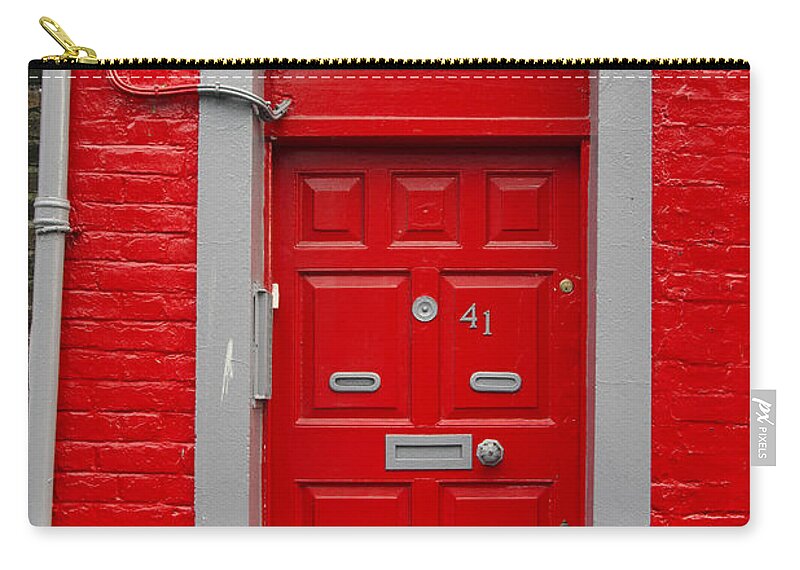 Colorful Zip Pouch featuring the photograph Colorful red door on red wall by RicardMN Photography