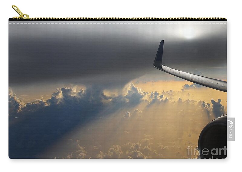 Airplane Zip Pouch featuring the photograph Coming thru the storm by Bob Hislop