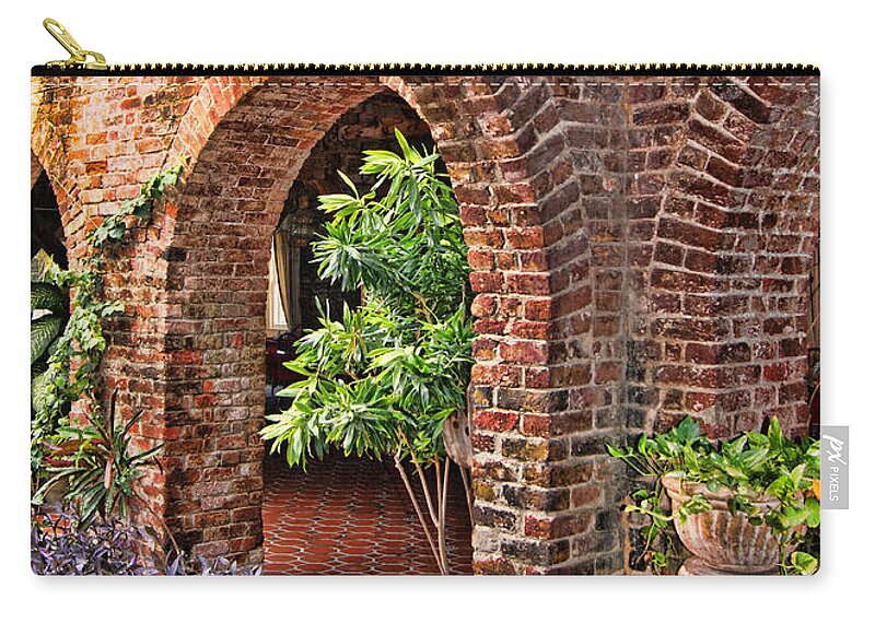 Architecture Zip Pouch featuring the photograph Copper and Lumber Hotel by Olga Hamilton