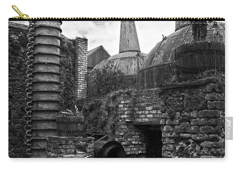 Locke Zip Pouch featuring the photograph Copper pot stills and column still at Lockes Distillery BW by RicardMN Photography