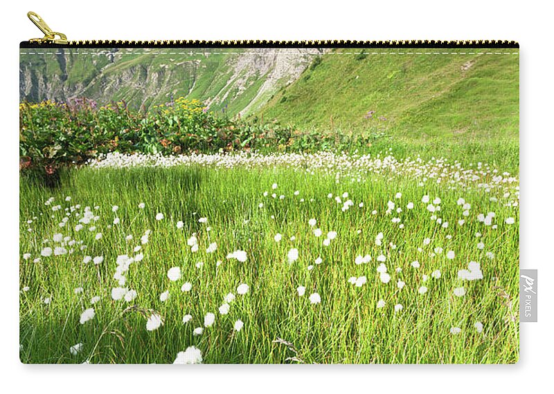 Scenics Zip Pouch featuring the photograph Cotton Grass In A Meadow, Allgäuer Alps by Ingmar Wesemann