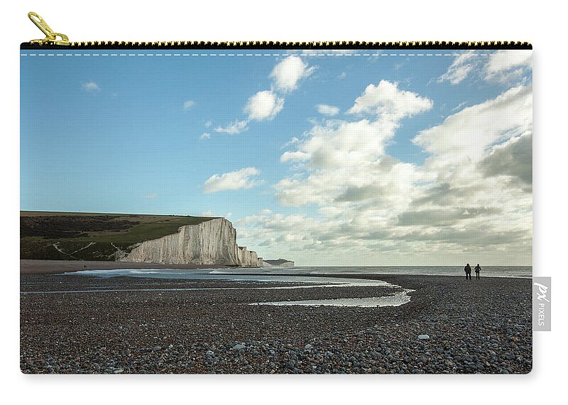 Tranquility Zip Pouch featuring the photograph Couple Standing On Beach At Cucmere by Paul Mansfield Photography