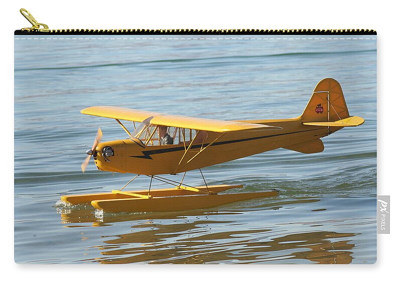 Piper Cub Zip Pouch featuring the photograph Cub on floats by David S Reynolds