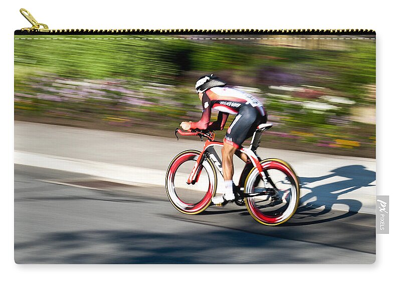 Cyclist Zip Pouch featuring the photograph Cyclist Racing the Clock by Kevin Desrosiers