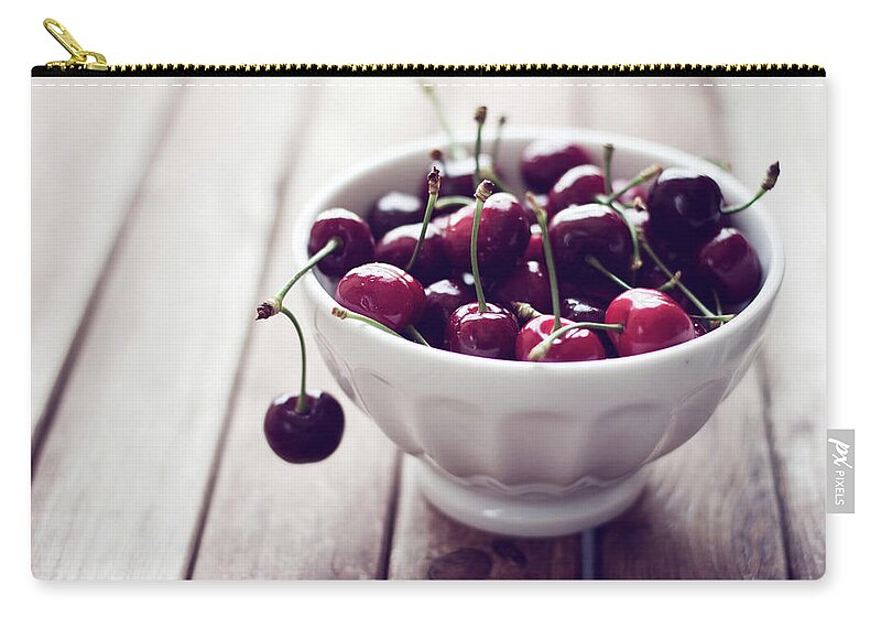 Cherry Zip Pouch featuring the photograph Dark Red Cherries In White Bowl by Copyright Anna Nemoy(xaomena)