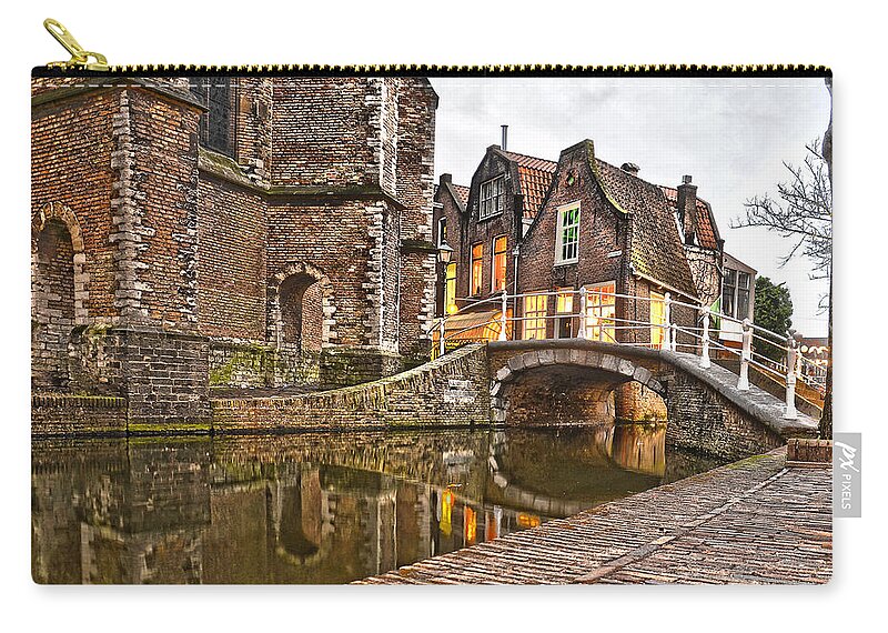Holland Zip Pouch featuring the photograph Delft Behind The Church by Frans Blok