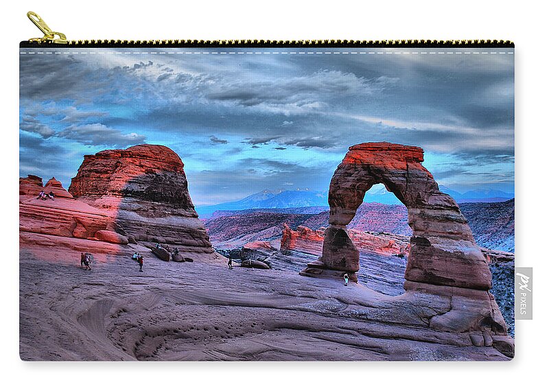 America Zip Pouch featuring the photograph Delicate Arch at Sunset by Gregory Ballos