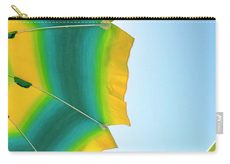 Clear Sky Zip Pouch featuring the photograph Detail Of Beach Umbrella by Stefano Salvetti