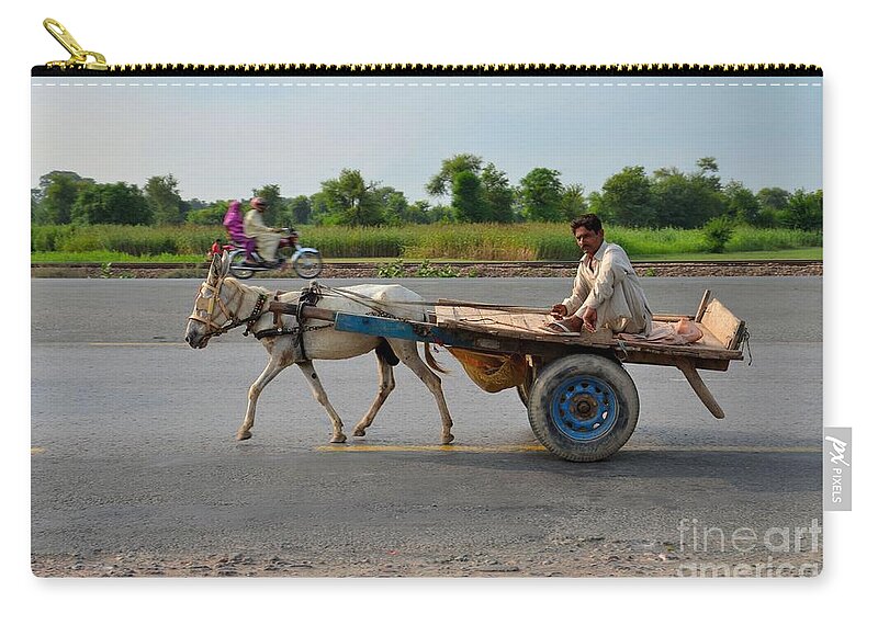 Donkey Zip Pouch featuring the photograph Donkey cart driver and motorcycle on Pakistan highway by Imran Ahmed