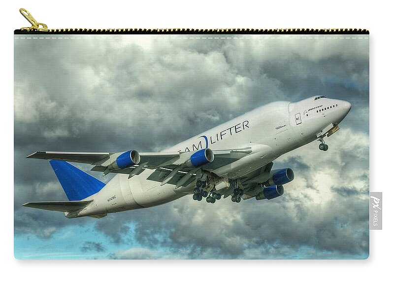 747 Zip Pouch featuring the photograph Dreamlifter Takeoff by Jeff Cook