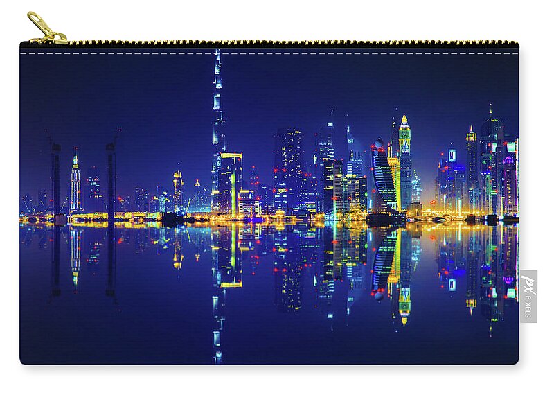 Downtown District Zip Pouch featuring the photograph Dubai Skyline Reflection At Night by Serts