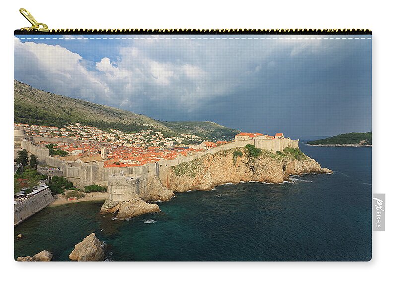 Tranquility Zip Pouch featuring the photograph Dubrovnik Walls And Old City In Croatia by © Frédéric Collin