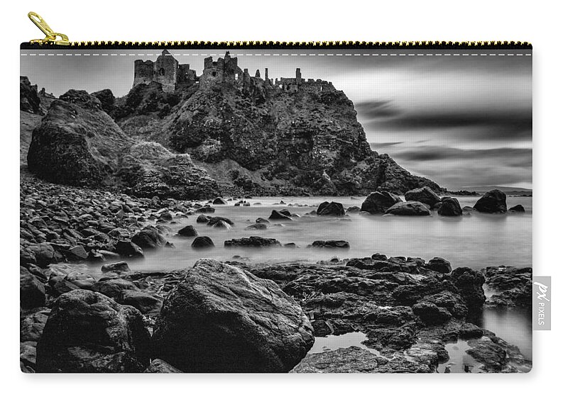 Dunluce Carry-all Pouch featuring the photograph Dunluce Castle by Nigel R Bell