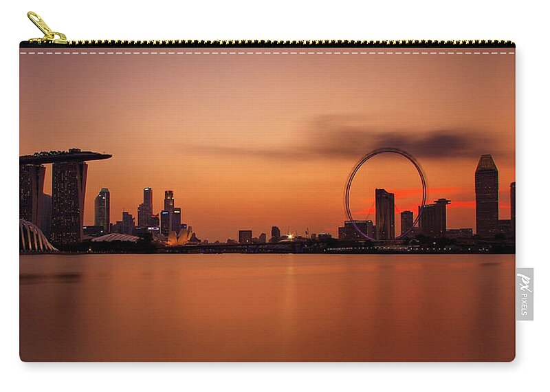 Panoramic Zip Pouch featuring the photograph Dusk At Marina Bay Sands + Singapore by © Copyright Kengoh8888