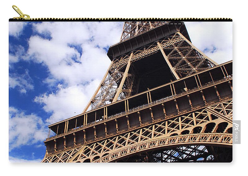 Eiffel Zip Pouch featuring the photograph Eiffel tower with blue sky by Elena Elisseeva