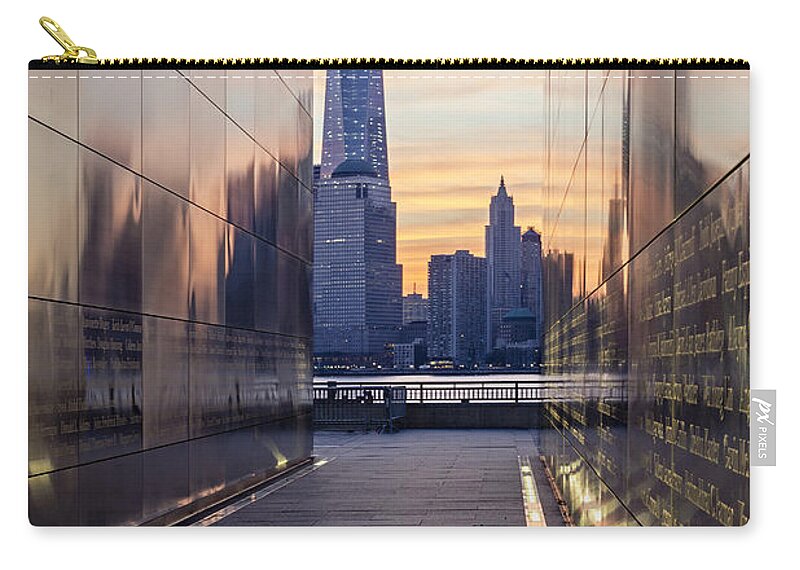 Financial District Zip Pouch featuring the photograph Empty Sky Memorial And The Freedom Tower by Susan Candelario
