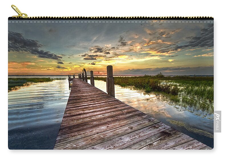 Clouds Carry-all Pouch featuring the photograph Evening Dock by Debra and Dave Vanderlaan