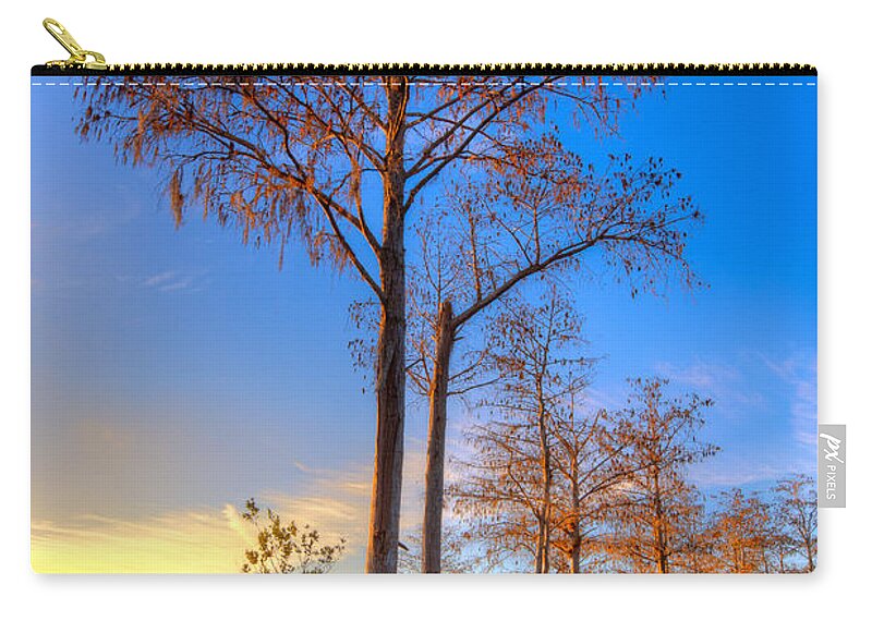 Clouds Carry-all Pouch featuring the photograph Everglades at Sunset by Debra and Dave Vanderlaan