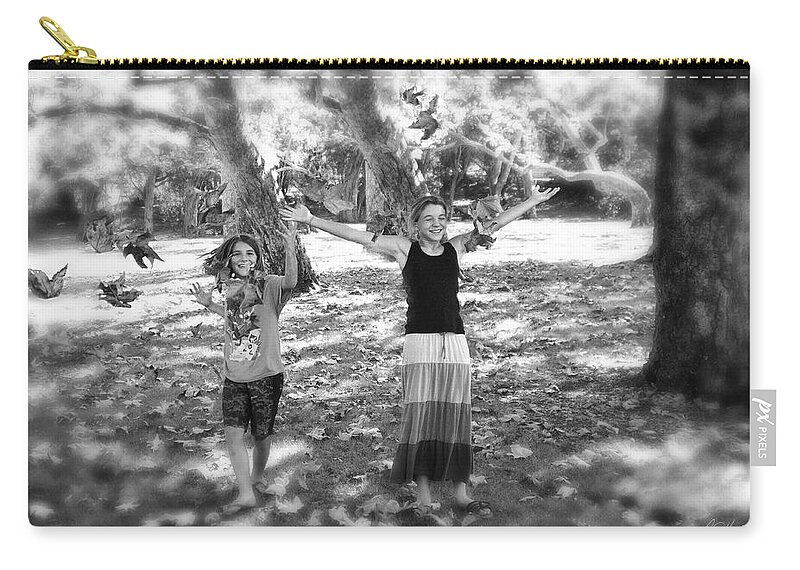 Falling Zip Pouch featuring the photograph Falling Leaves by Diana Haronis