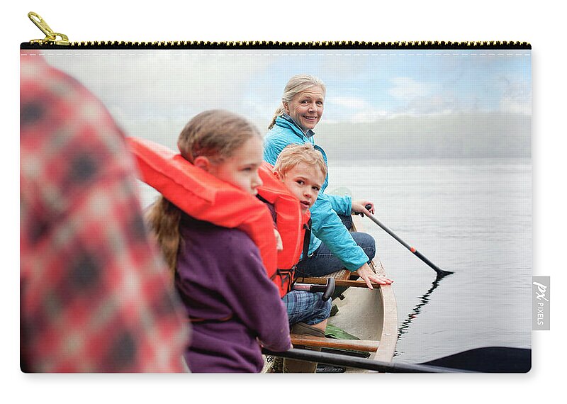 45-49 Years Zip Pouch featuring the photograph Family Canoes On Kezar Lake by Monica Donovan