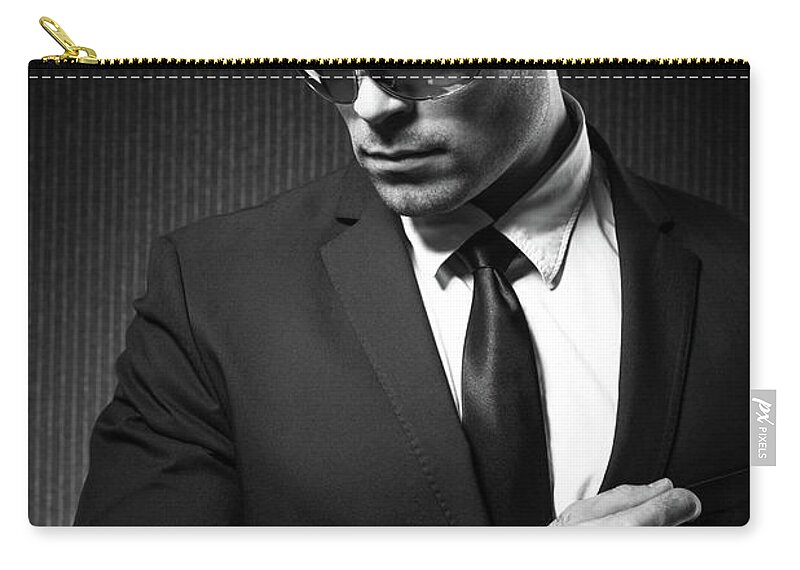 Expertise Zip Pouch featuring the photograph Fashion Man by Georgijevic