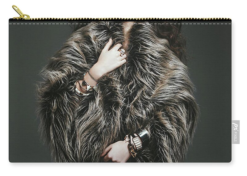 Cool Attitude Zip Pouch featuring the photograph Fashion Model In Fur Coat by Lambada
