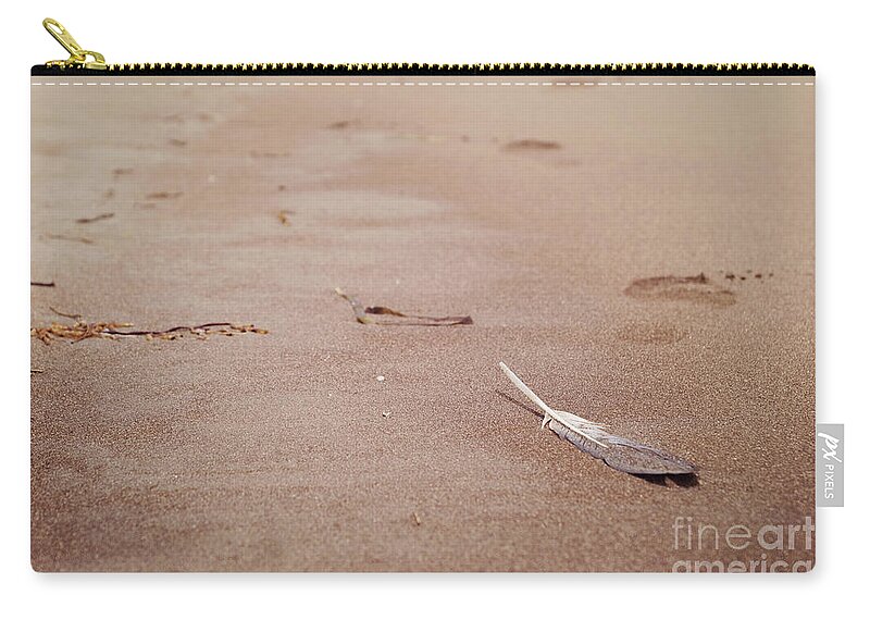 California Zip Pouch featuring the photograph Feather on sand by Cindy Garber Iverson