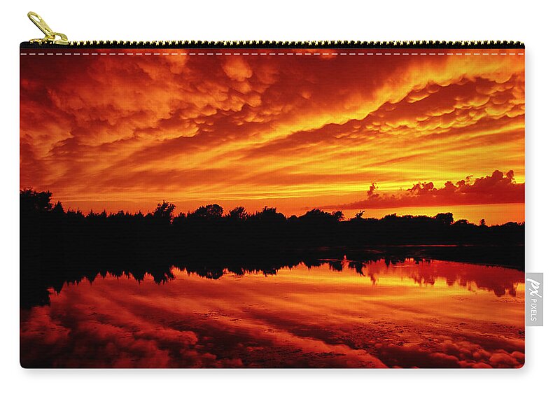 Sunset Zip Pouch featuring the photograph Fire in the Sky by Jason Politte