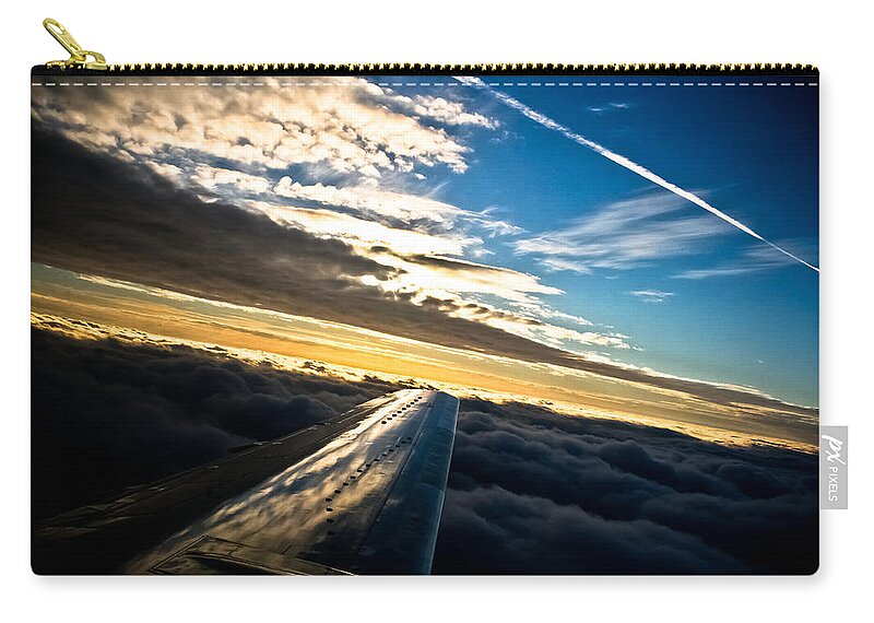 Flight Zip Pouch featuring the photograph Flight 777 by Joel Loftus
