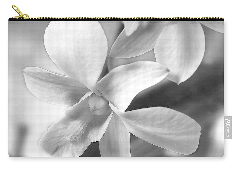 White Orchid Carry-all Pouch featuring the photograph White Orchid by Mike McGlothlen