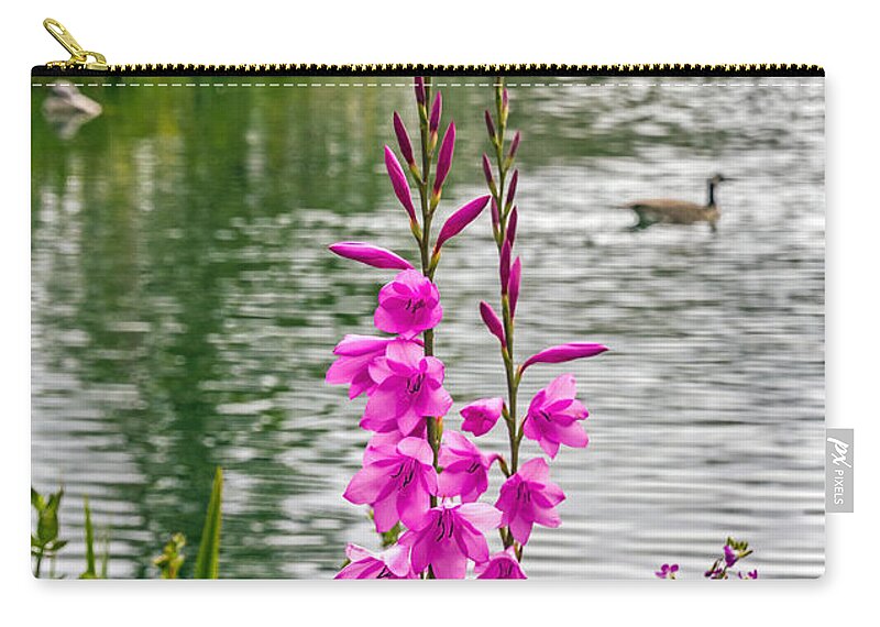 Bird Zip Pouch featuring the photograph Flowers at the Lake by Kate Brown