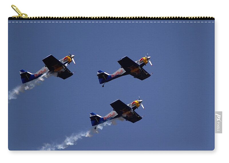 Red Bulls Aerobatics Zip Pouch featuring the photograph Flying Bulls by Ramabhadran Thirupattur