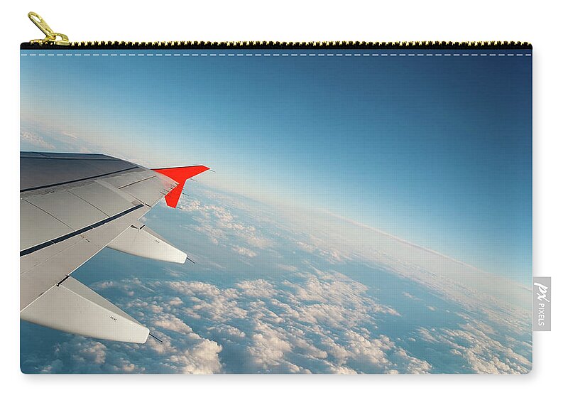Scenics Zip Pouch featuring the photograph Flying Over The Clouds by Neyya
